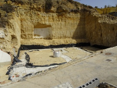 South-facing 135m² building plot in Rojales village centre with foundations laid for a 4-bedroom townhouse